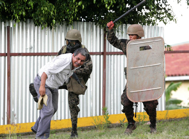 Caras y voces de la represión en Honduras